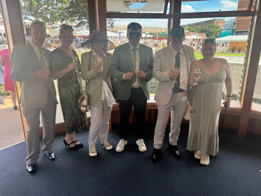 Enjoying champagne in the winners' room